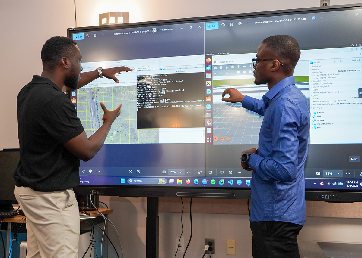 David Nyarko and Awotwi Baffoe review their cyber-resilient UAV anomaly detection simulation in the DEPA Research Lab at Morgan State University